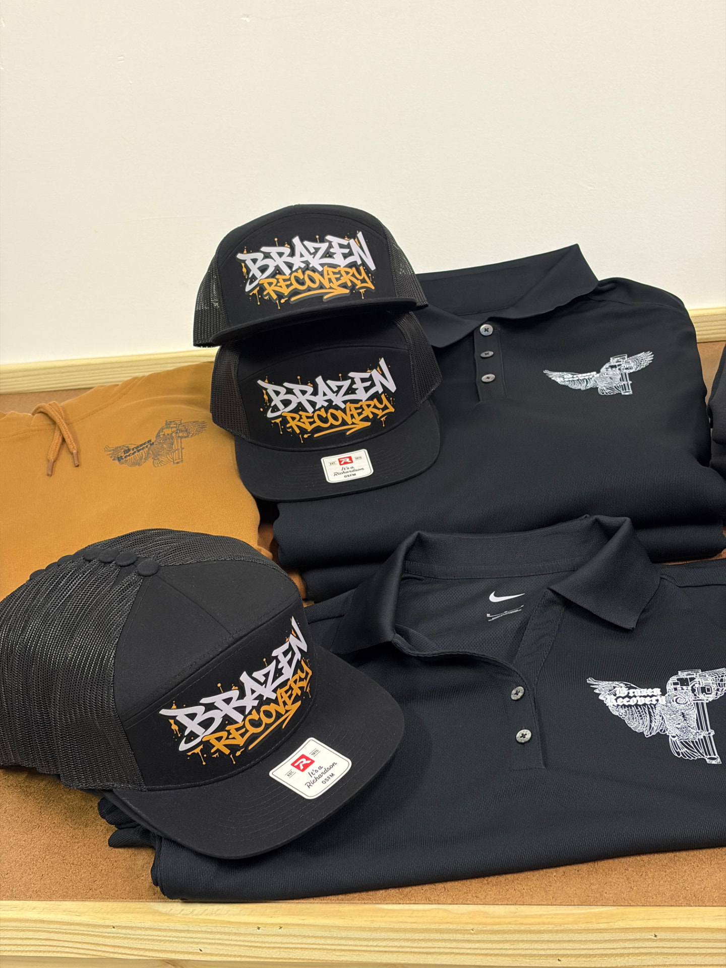 Custom hats and printed polo shirts by Dava X